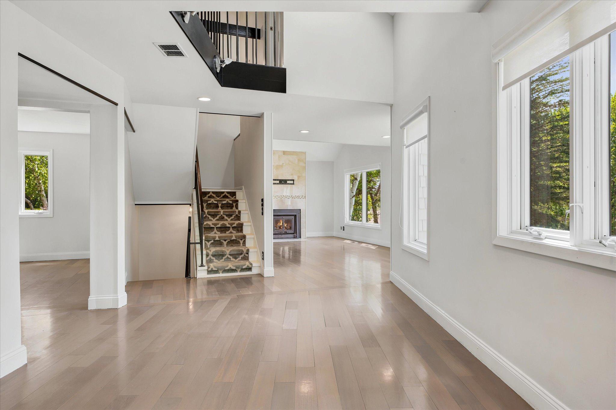 Open concept home with window views from every room and skylight with balcony. *Keep home as primary, or Approved for ADU/guest house - modifications to complete with your builder. Survey available with new placement for your dream home!
