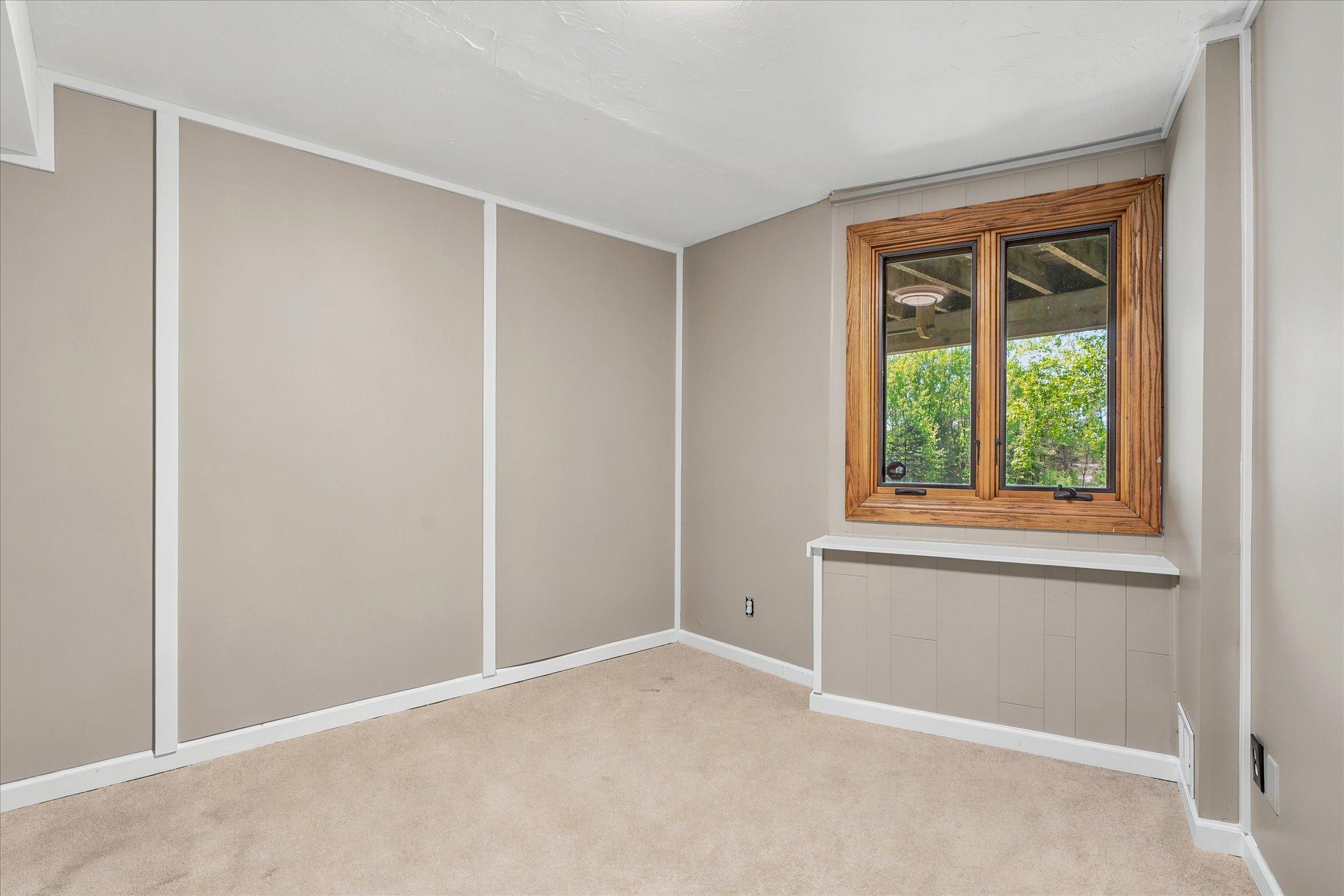 5th bedroom in lower level with large walk-in closet. *Keep home as primary, or Approved for ADU/guest house - modifications to complete with your builder. Survey available with new placement for your dream home!