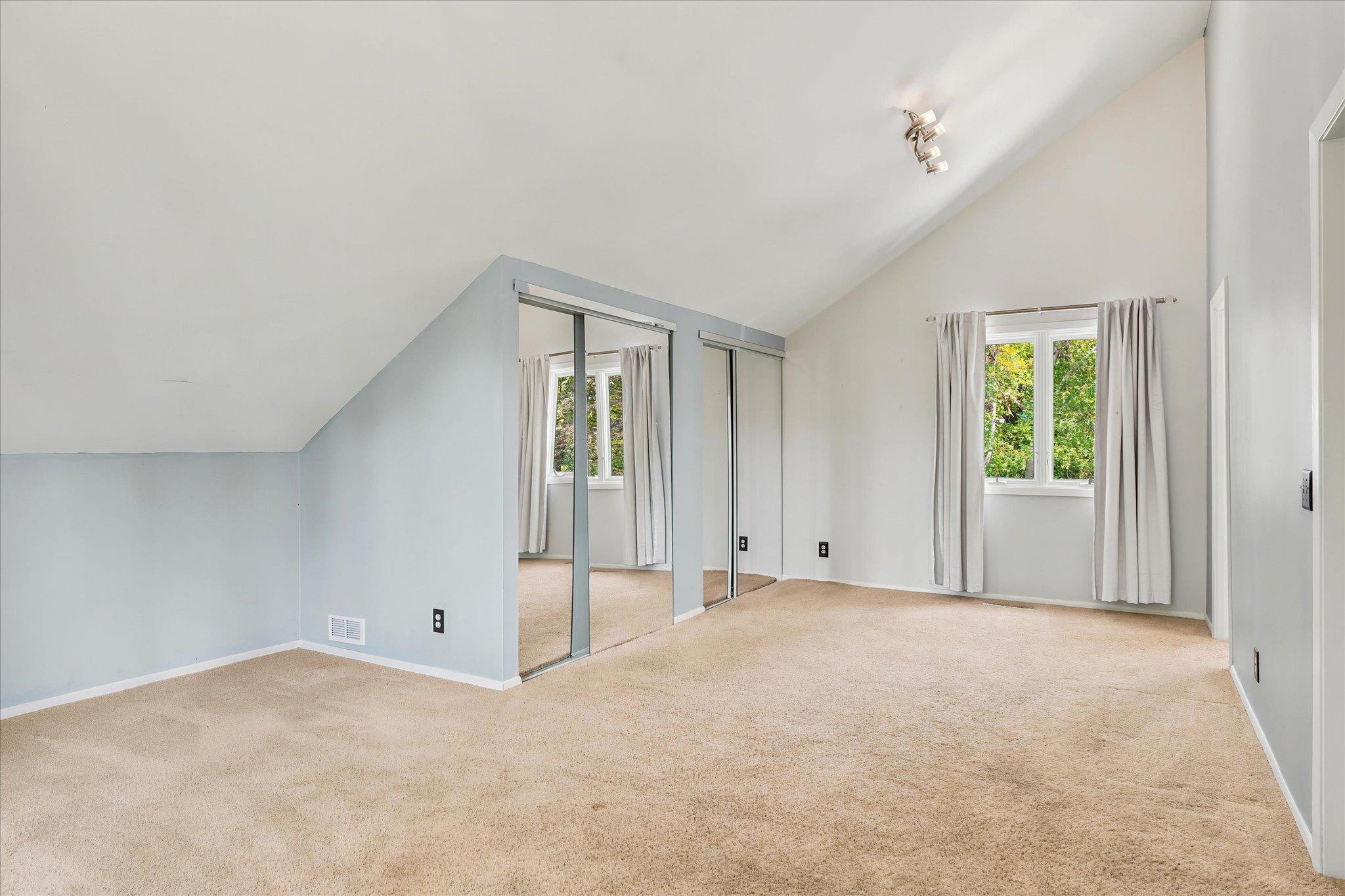Vaulted Primary Bedroom with 1/2 Bath. *Keep home as primary, or Approved for ADU/guest house - modifications to complete with your builder. Survey available with new placement for your dream home!