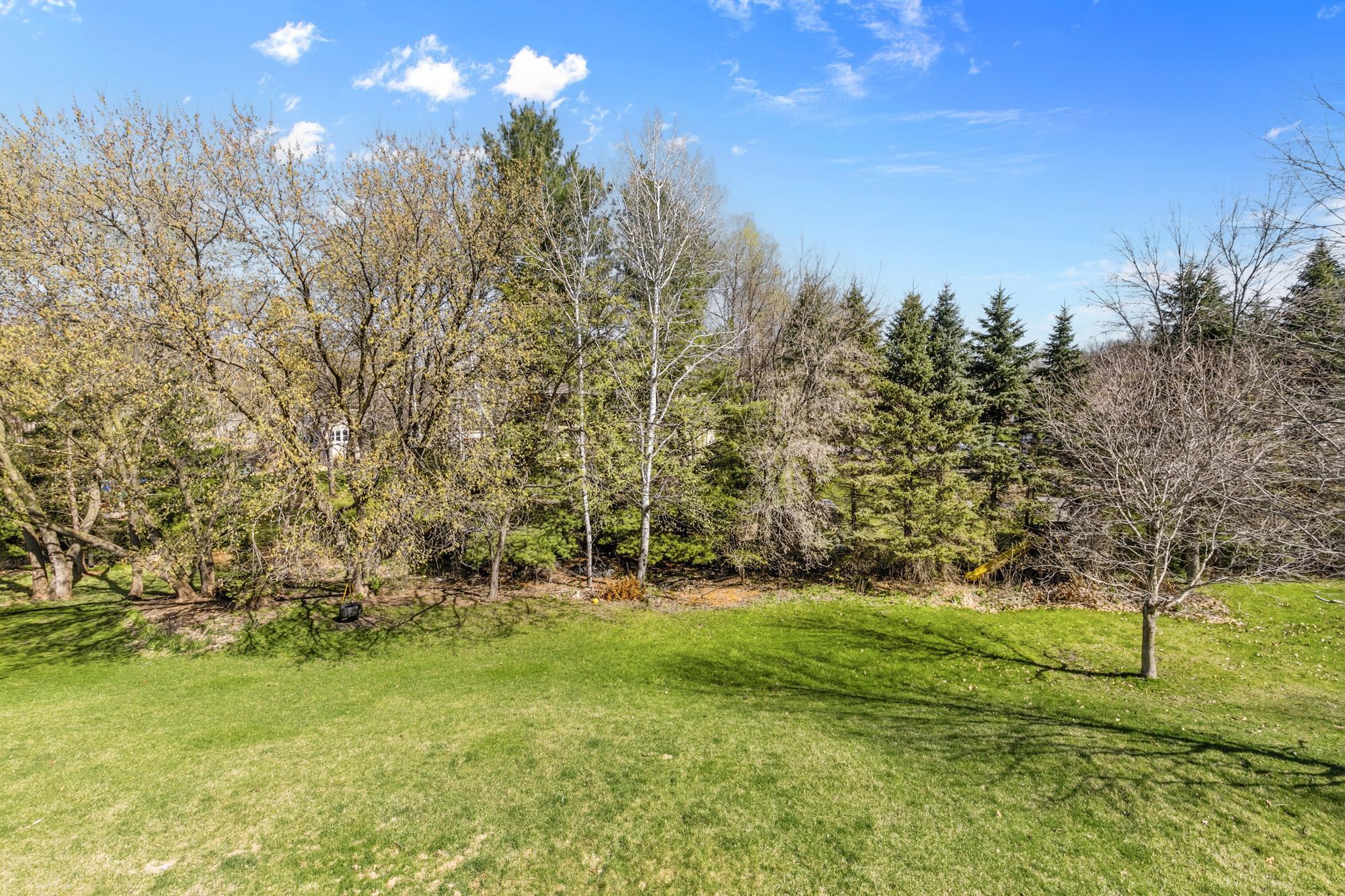 The very spacious backyard is private in all seasons. Great for all of your outdoor activities.
