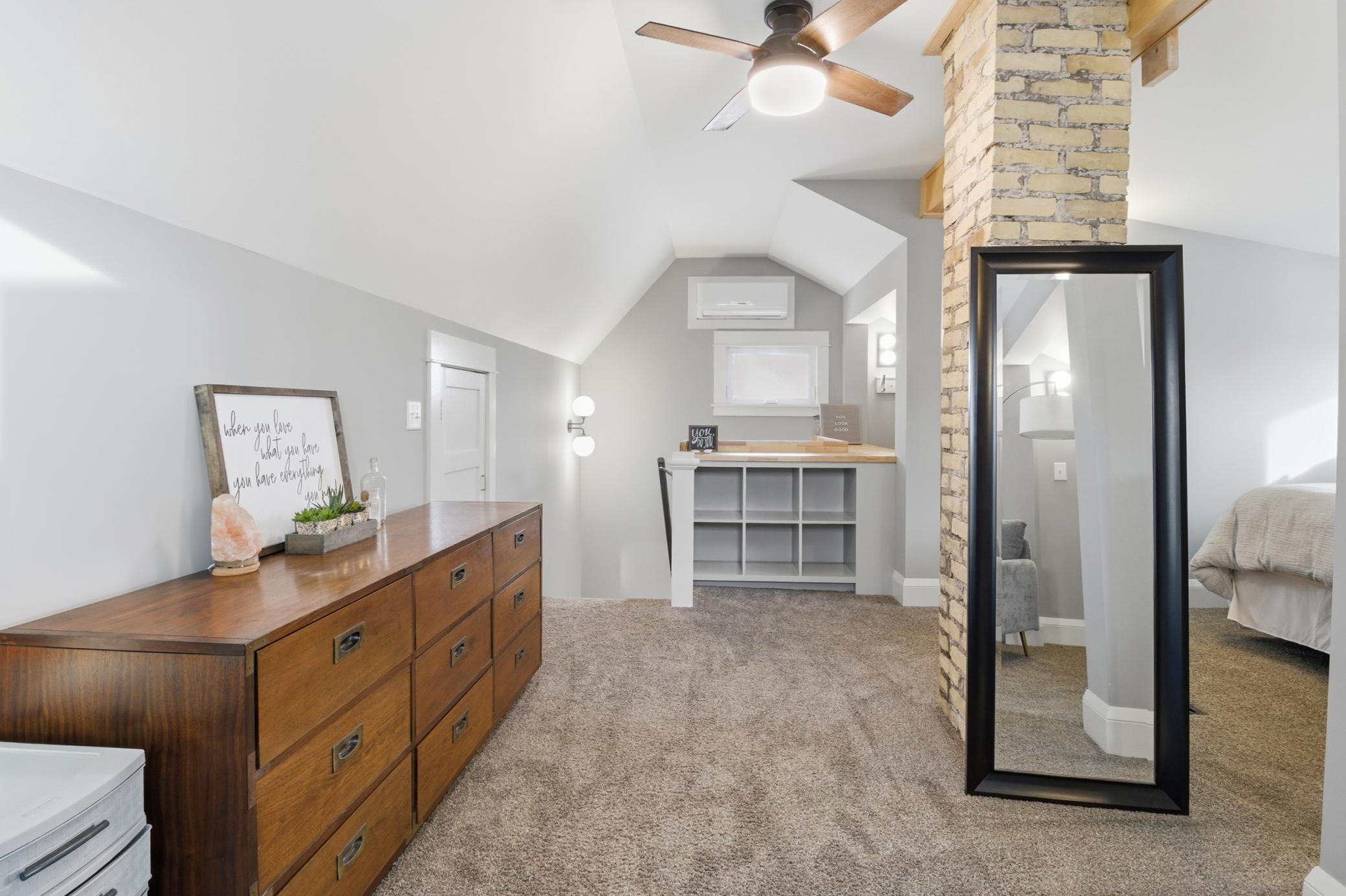 There is also hidden storage thanks to the attic space through the small doors along the walls.