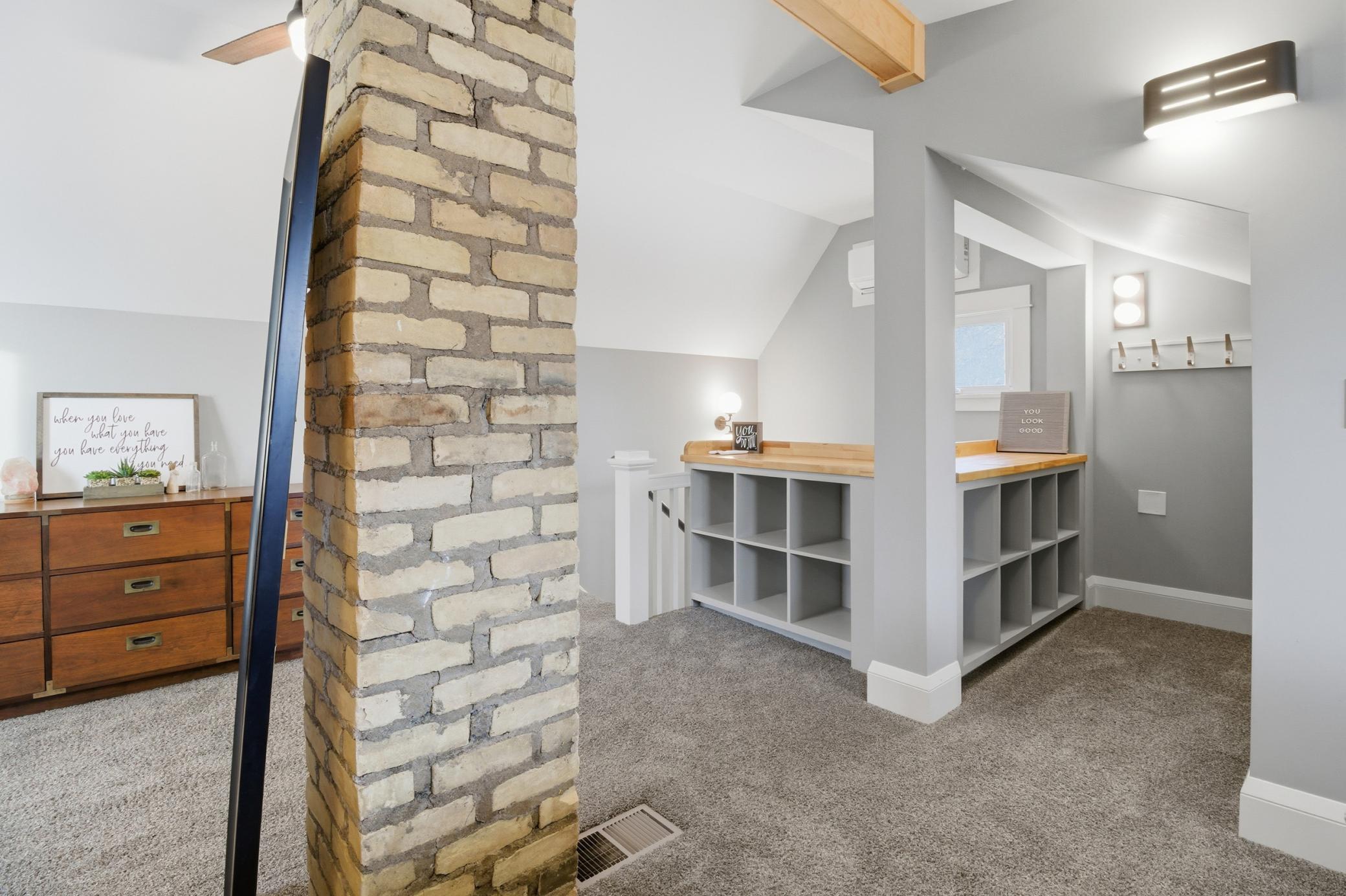 Upper level offers a huge bedroom and TONS of storage!