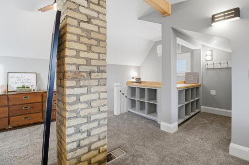 Upper level offers a huge bedroom and TONS of storage!