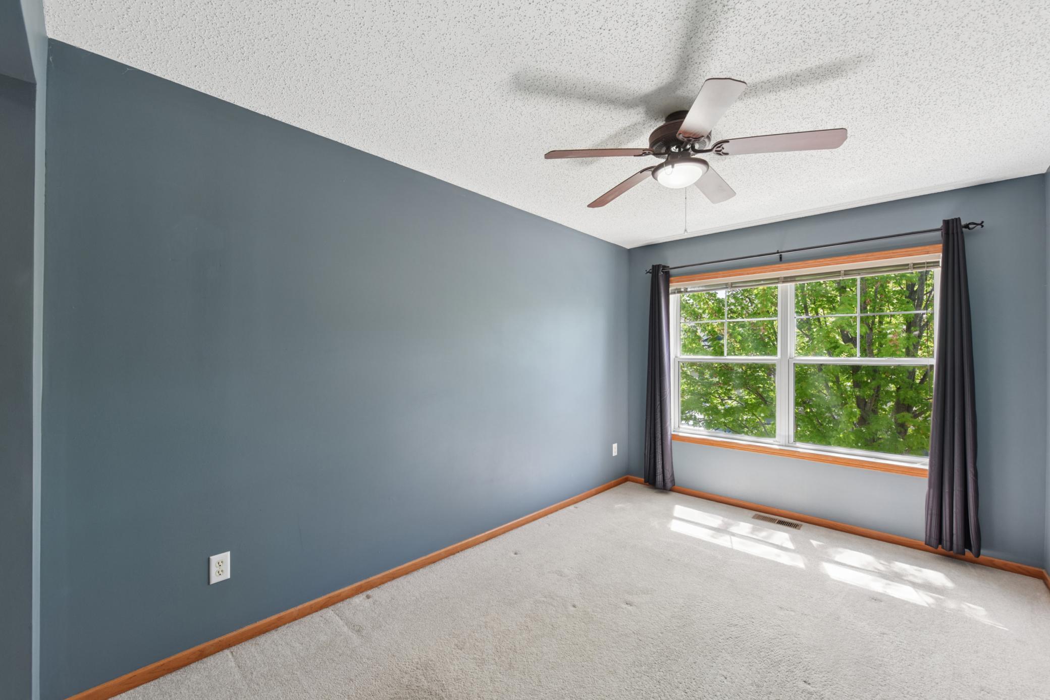 2489 Dawes Place #D - Large primary with ceiling fan and full bath