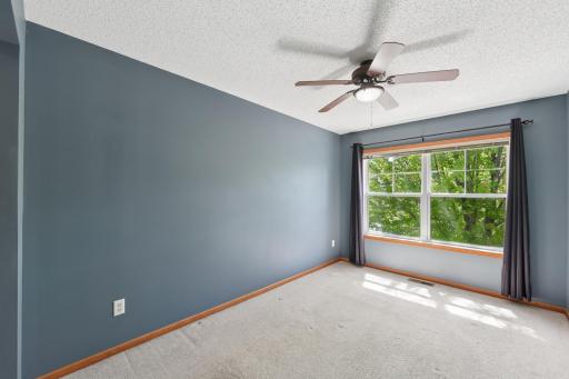 2489 Dawes Place #D - Large primary with ceiling fan and full bath