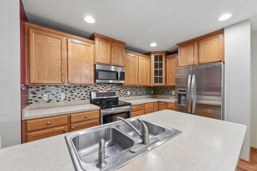 2489 Dawes Place #D - Stainless steel appliances and tile backsplash