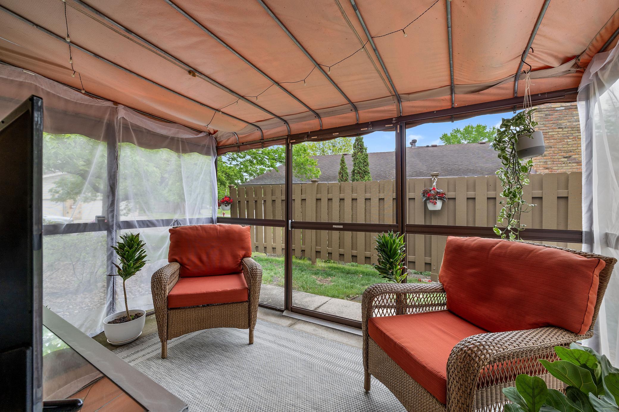 Enclosed screen porch on patio.
