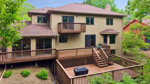 Multi tiered decks with a built-in gas fire pit for enjoying the outdoors