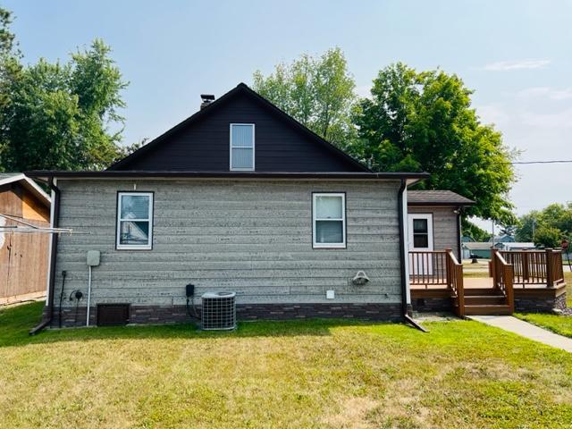 Back of home and central air unit