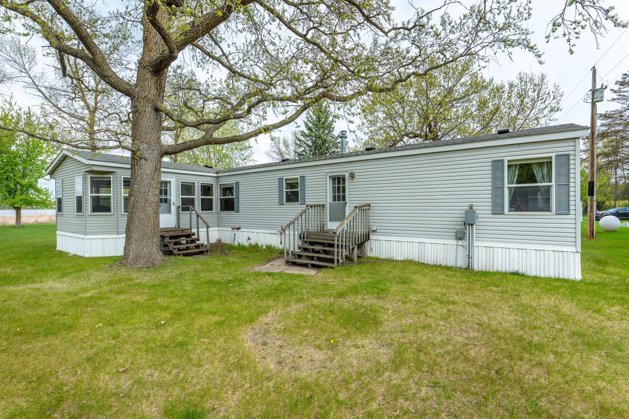 Manufactured home with sunroom addition