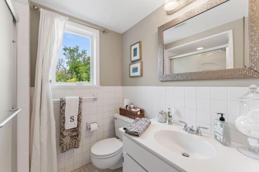 There is a 3/4 bath in the lower level with new shower tile and a linen closet.