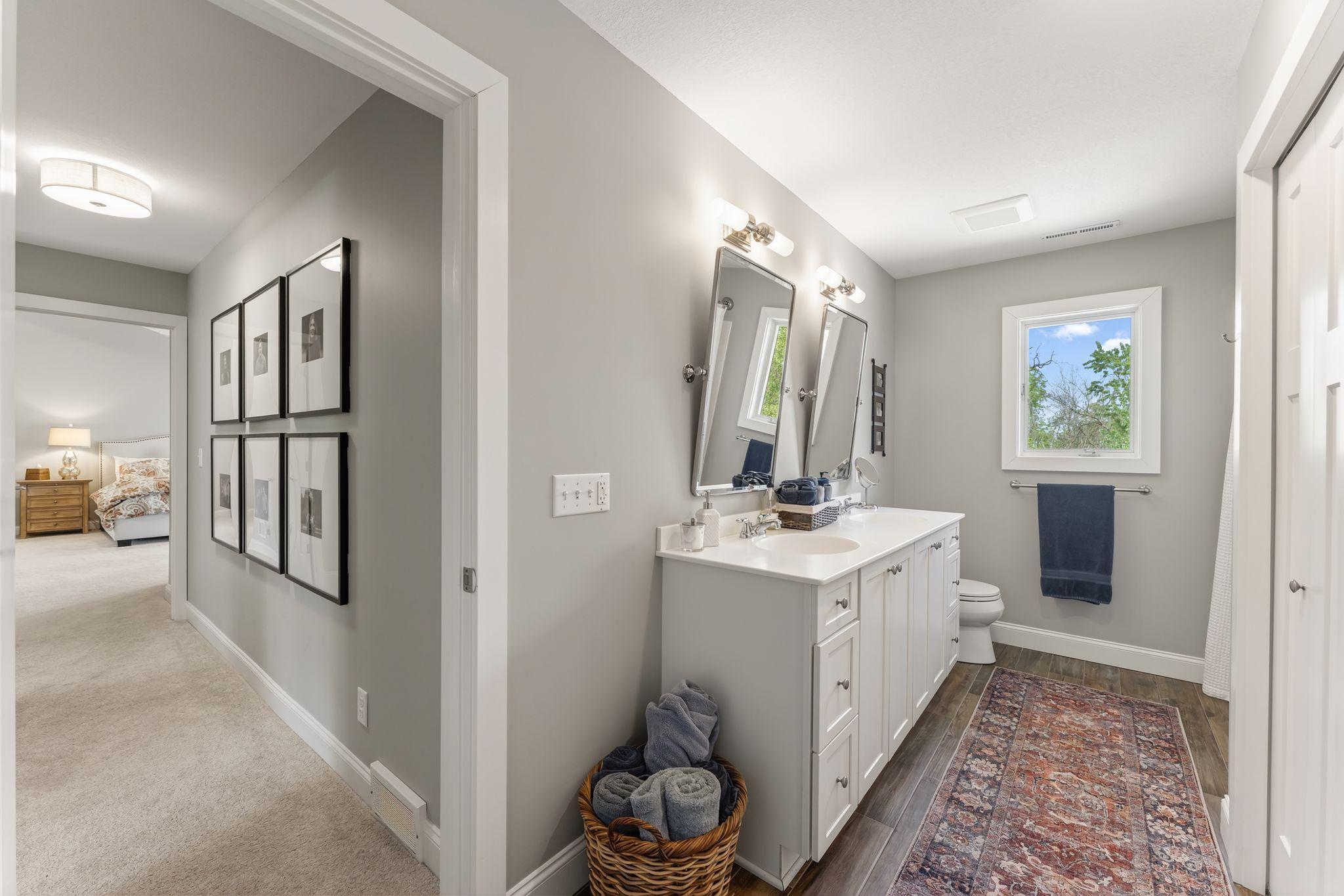 The upper level bath was renovated with tile flooring an has a washer dryer hook up in the closet!