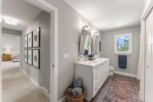 The upper level bath was renovated with tile flooring an has a washer dryer hook up in the closet!