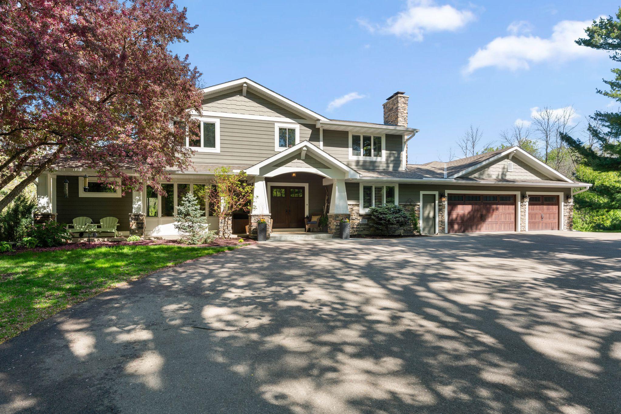 Completely updated exterior featuring James Hardie Siding and a welcoming covered front porch.