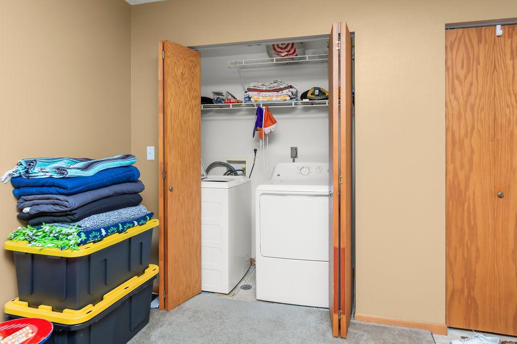 Laundry Closet w/ storage shelves