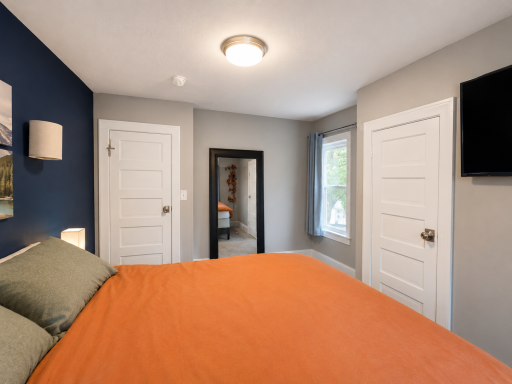 Large hidden 2nd closet behind the mirror door. -AI edited