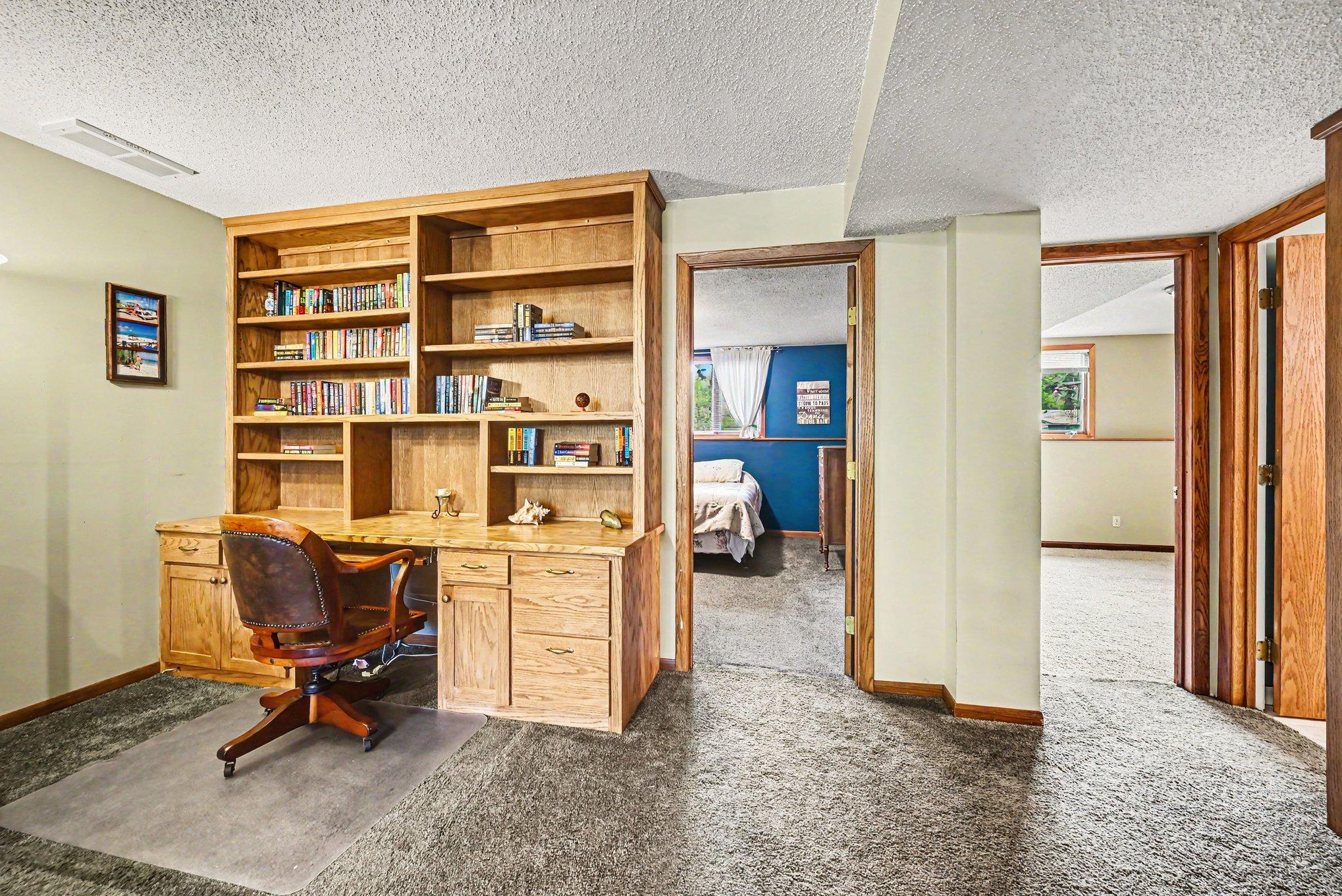 Desk and bookshelf are built-in and will stay with the sale. Two bedrooms and full bath with soaking tub.