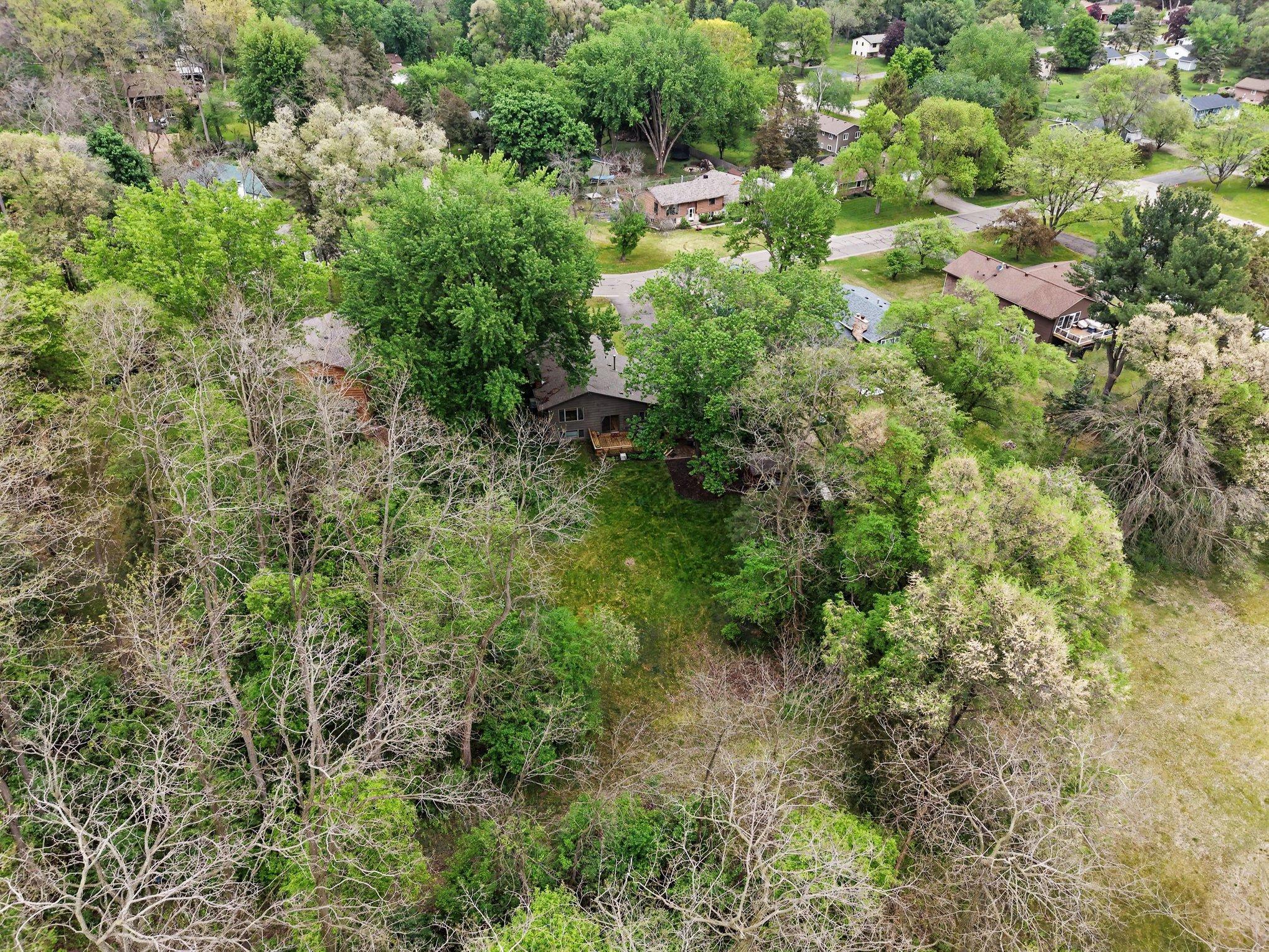 Wooded lot with walking trails into the Belwin