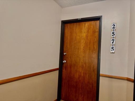 Go up 1 flight of stairs to unit door