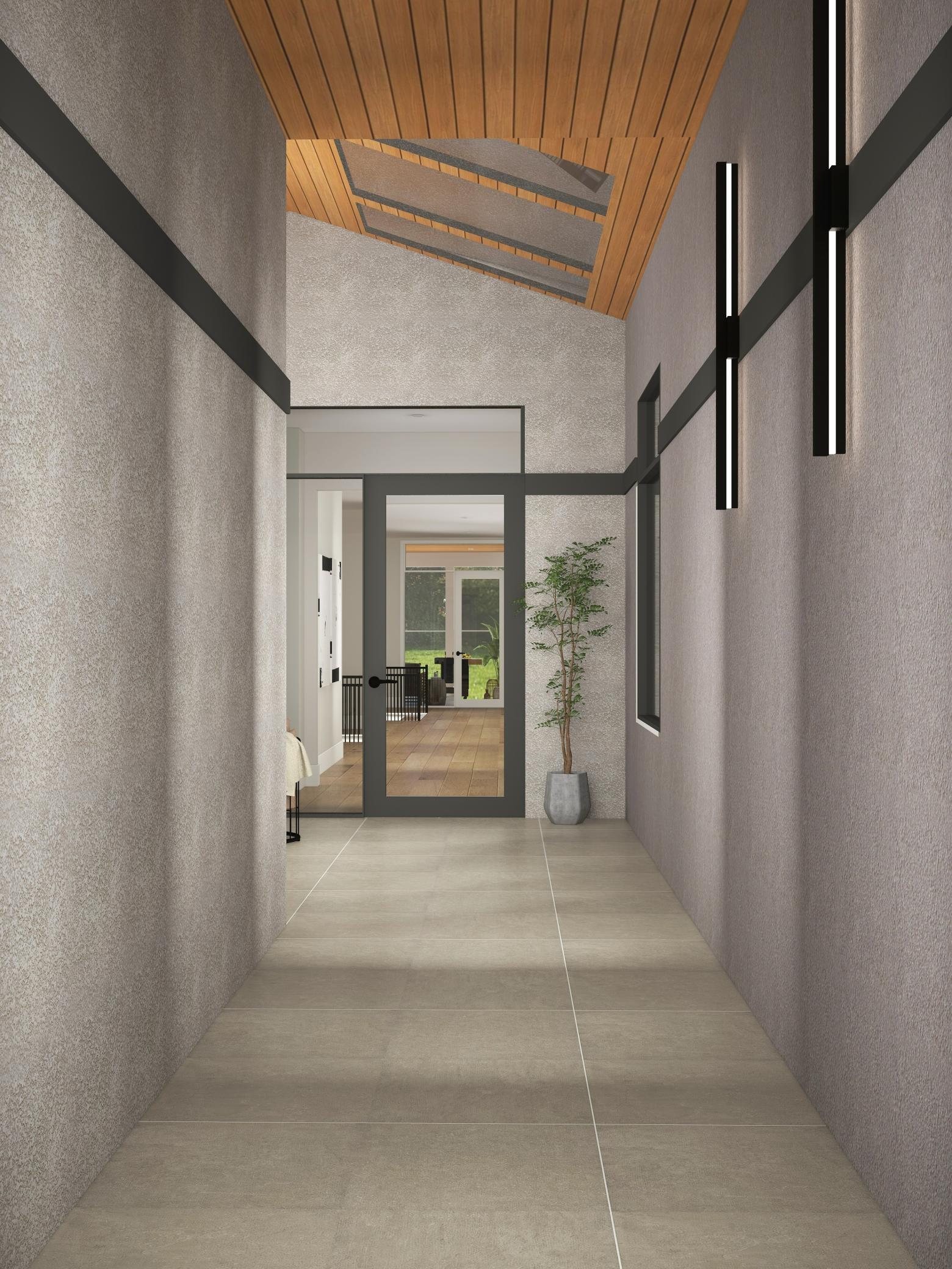 Portico to front door with skylights in courtyard