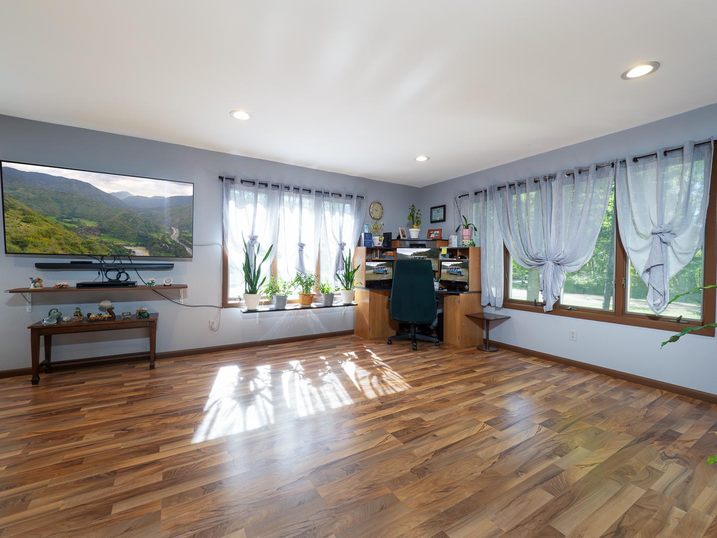 Spacious living room with loads of natural light.