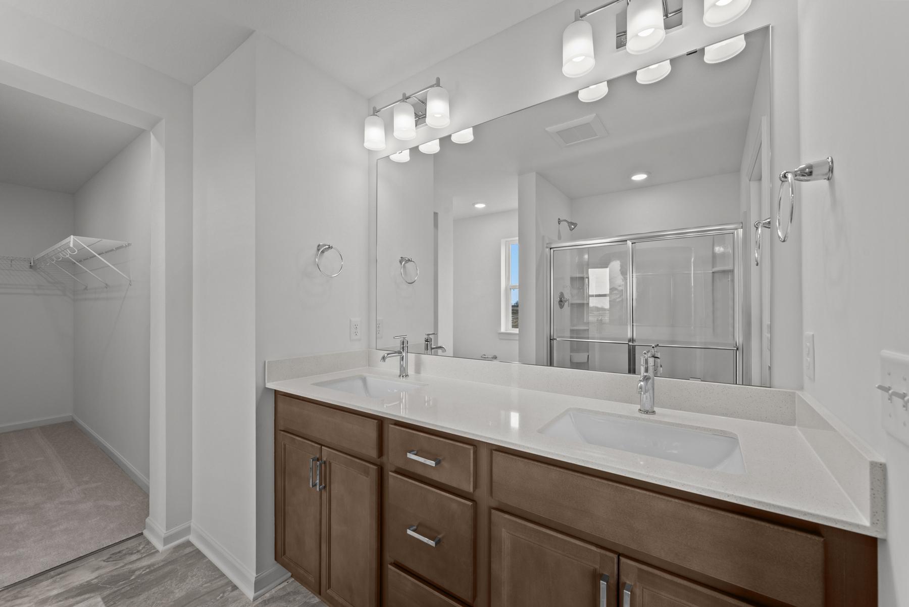 [L4-Spa-style primary bath in the McBee plan designed for daily relaxation. Images are from a similar home, interior selections may differ 09_z036]none36.jpg