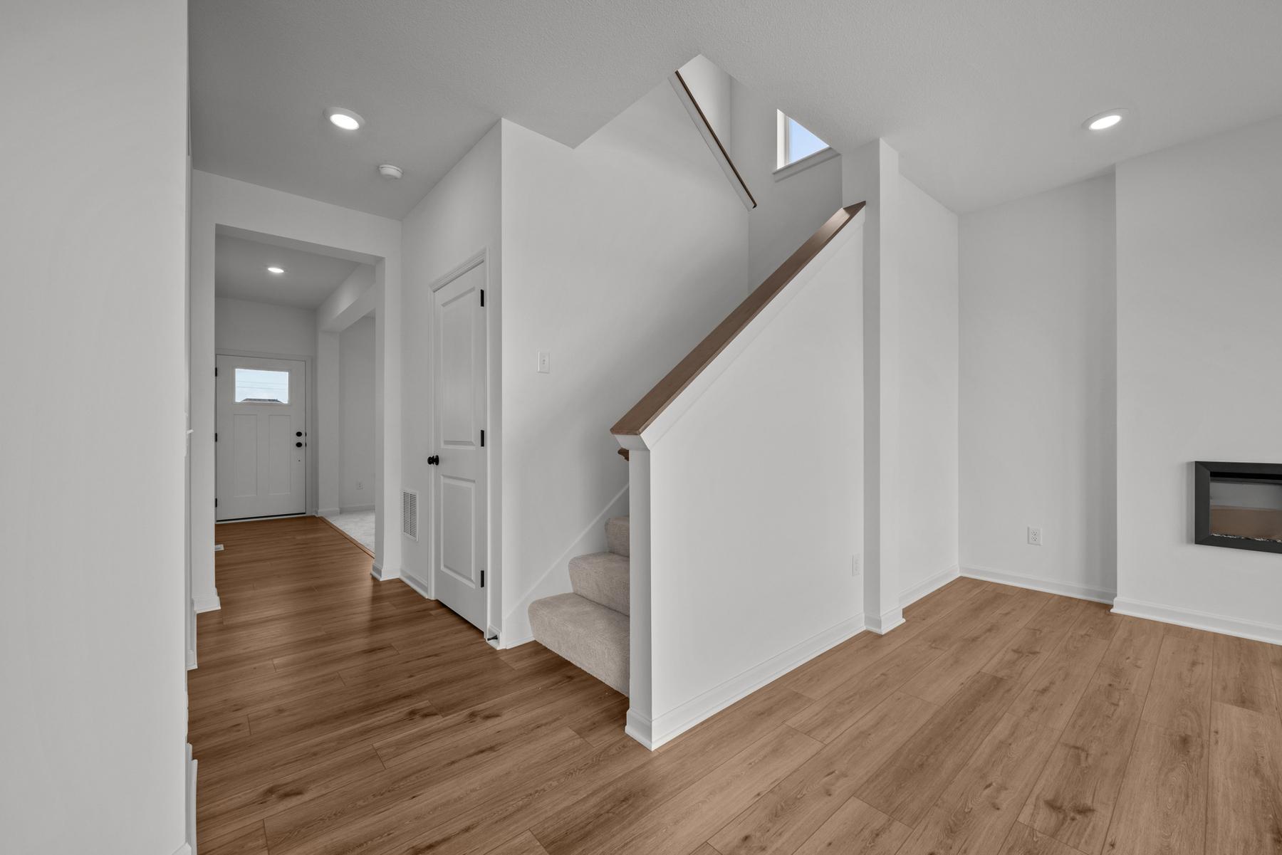 Defined entryway in the McBee plan creating a welcoming arrival and clear flow into the home. Images are from a similar home, interior selections may differ