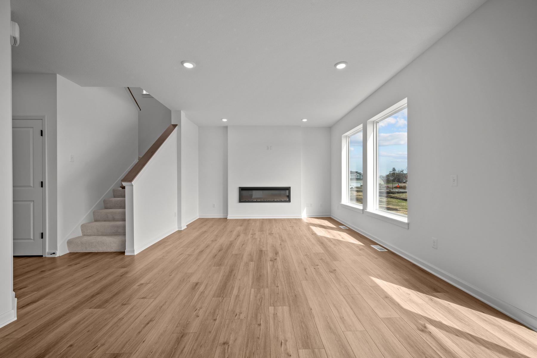 Spacious family room in the McBee plan designed for everyday comfort and connection. Images are from a similar home, interior selections may differ