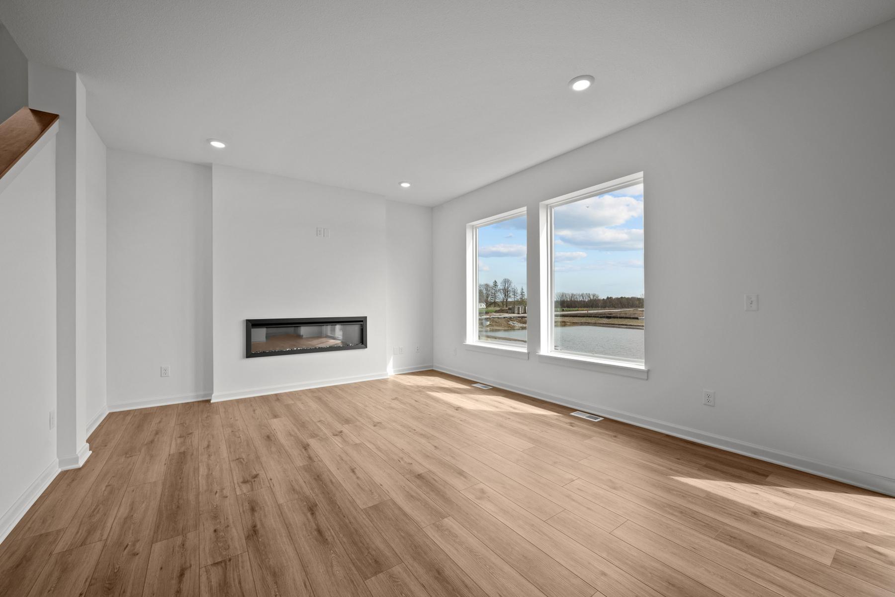Spacious family room in the McBee plan designed for everyday comfort and connection. Images are from a similar home, interior selections may differ