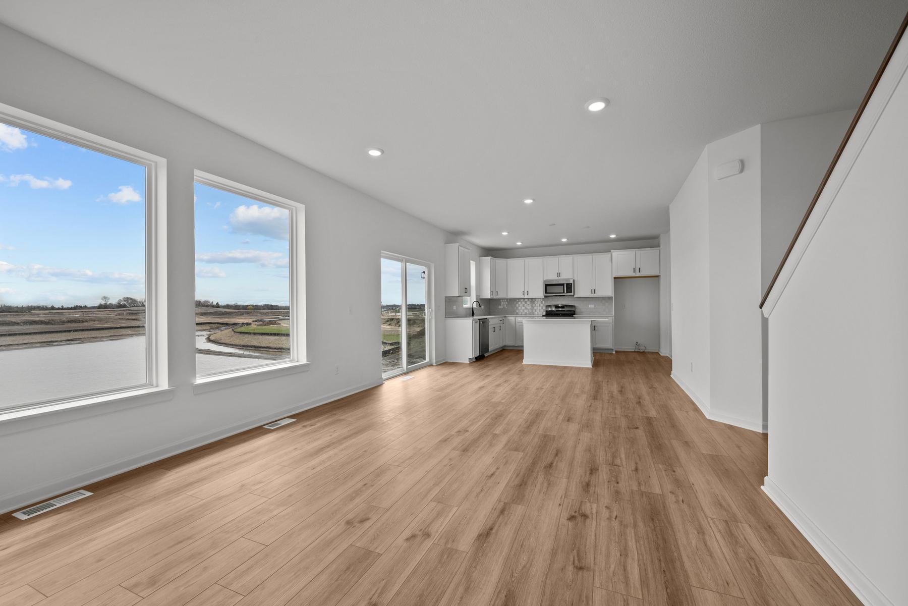 Spacious family room in the McBee plan designed for everyday comfort and connection. Images are from a similar home, interior selections may differ