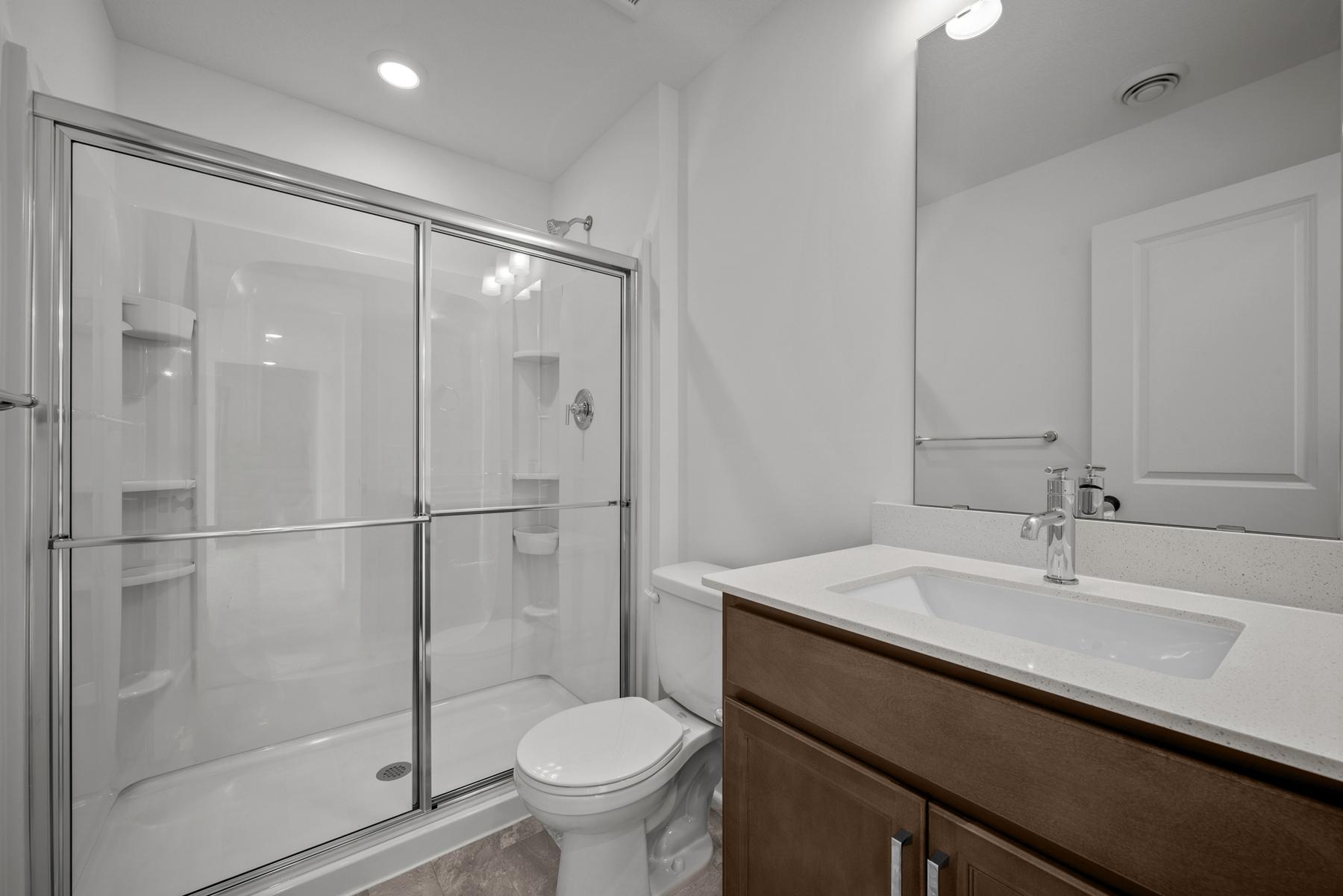 Spa-style primary bath in the McBee plan designed for daily relaxation. Images are from a similar home, interior selections may differ