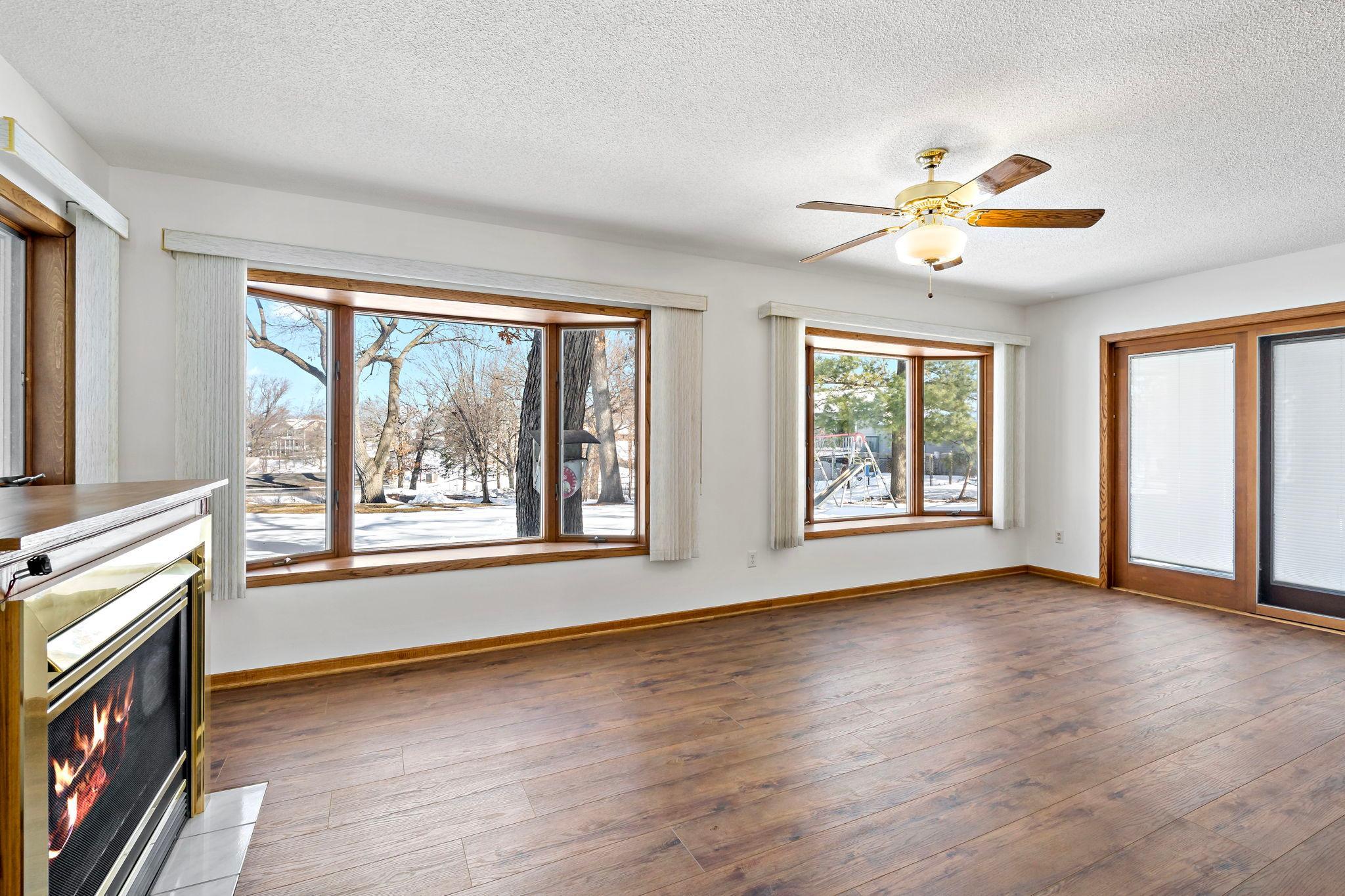 Sunroom with double bay windows facing Lower Prior Lake.