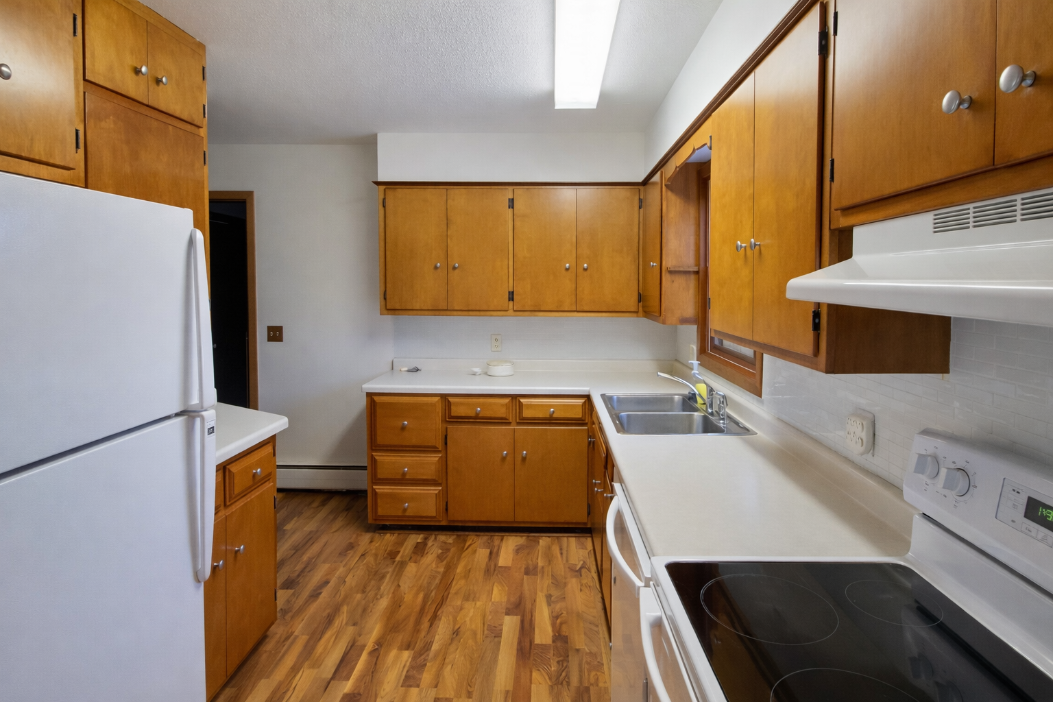 Classic Kitchen with natural wood cabinets