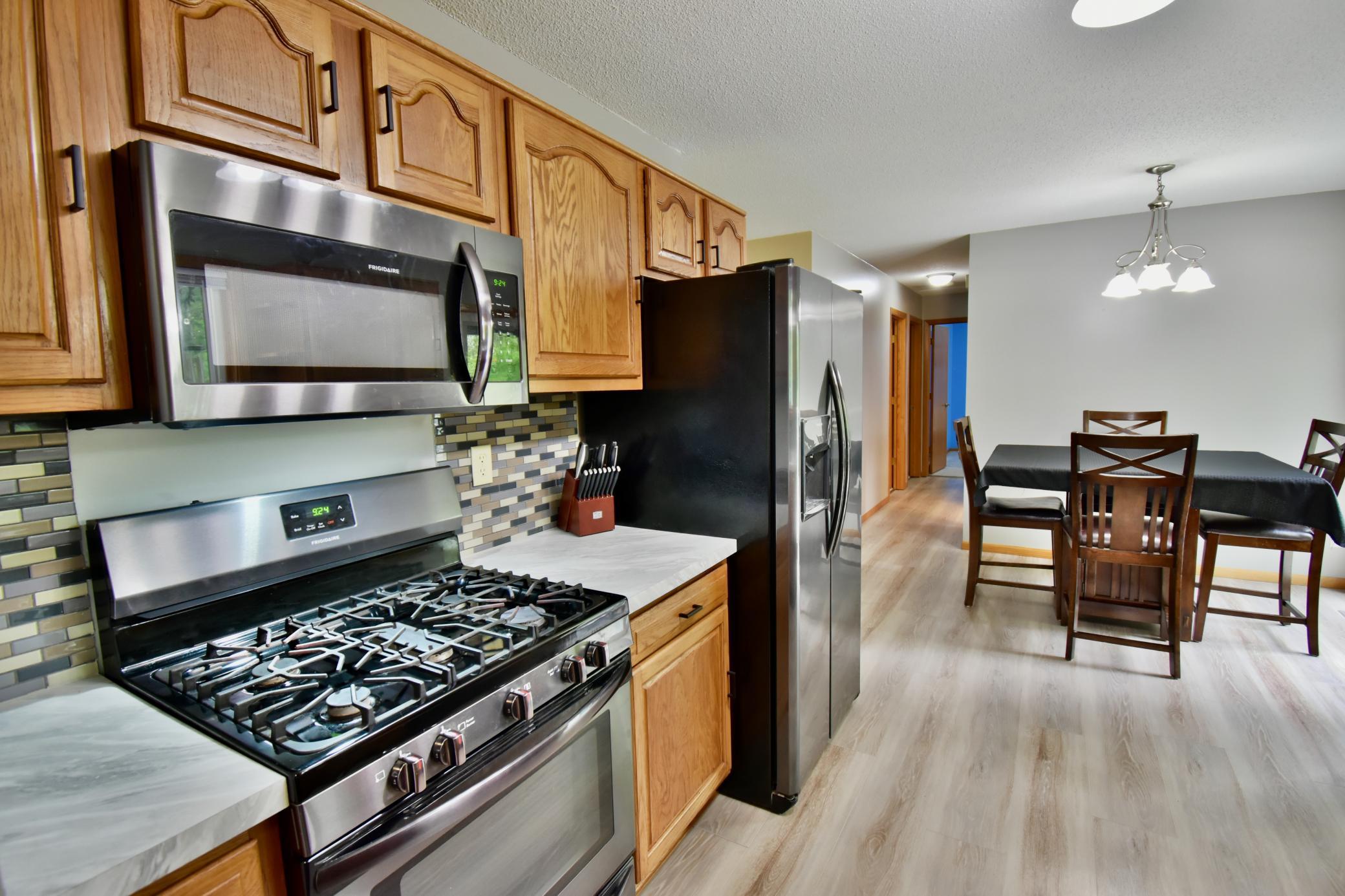 Another view of the kitchen as it leads into the dining area.