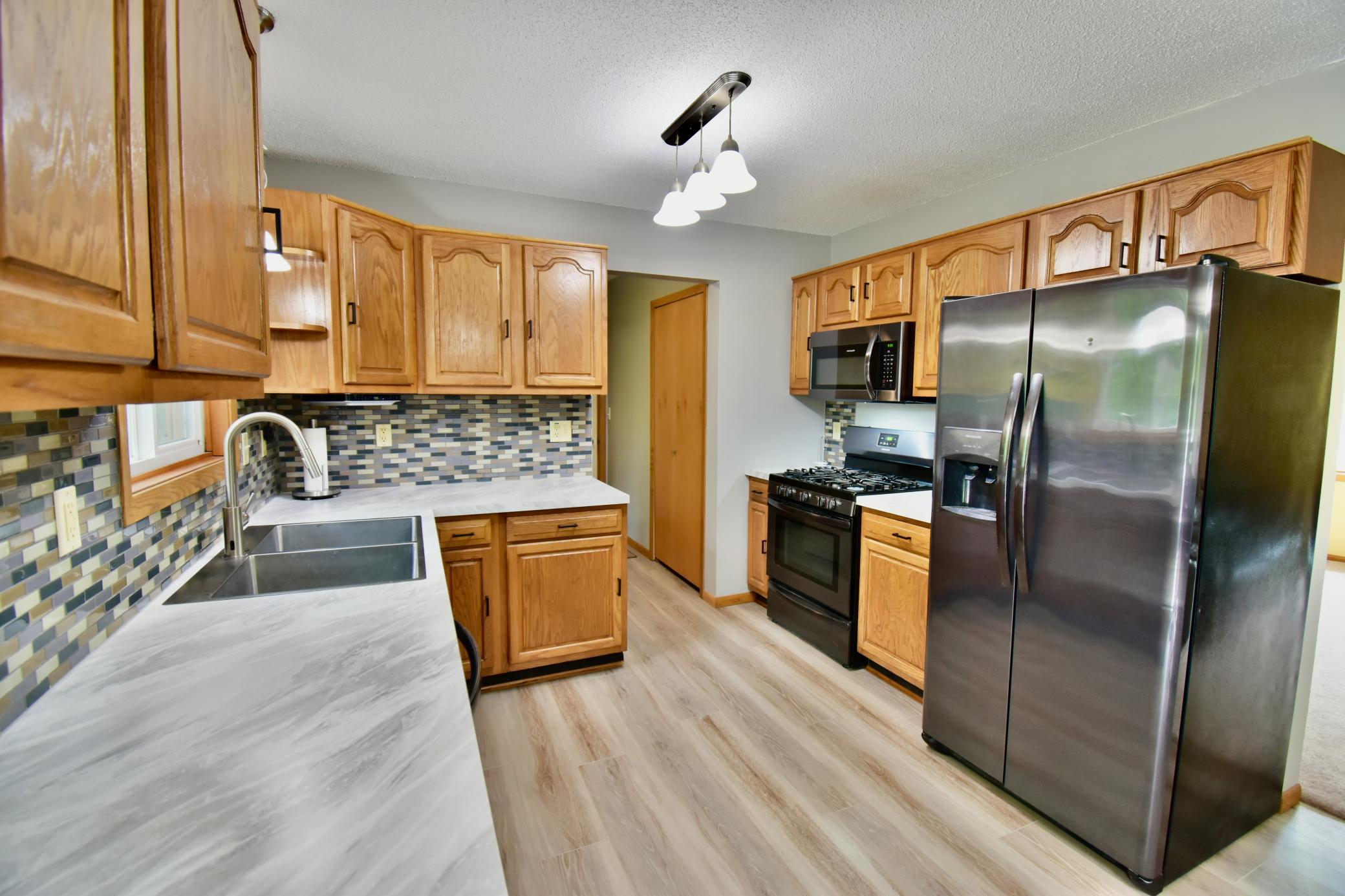 Updated kitchen with lots of space to prepare those family meals.