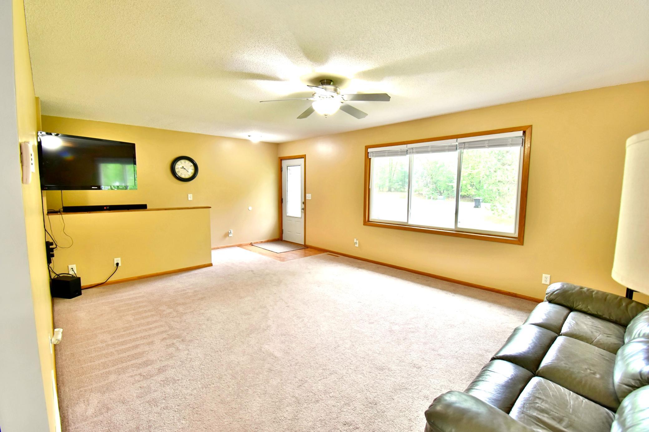 Another view of the living room from the dining room. Very open and spacious.