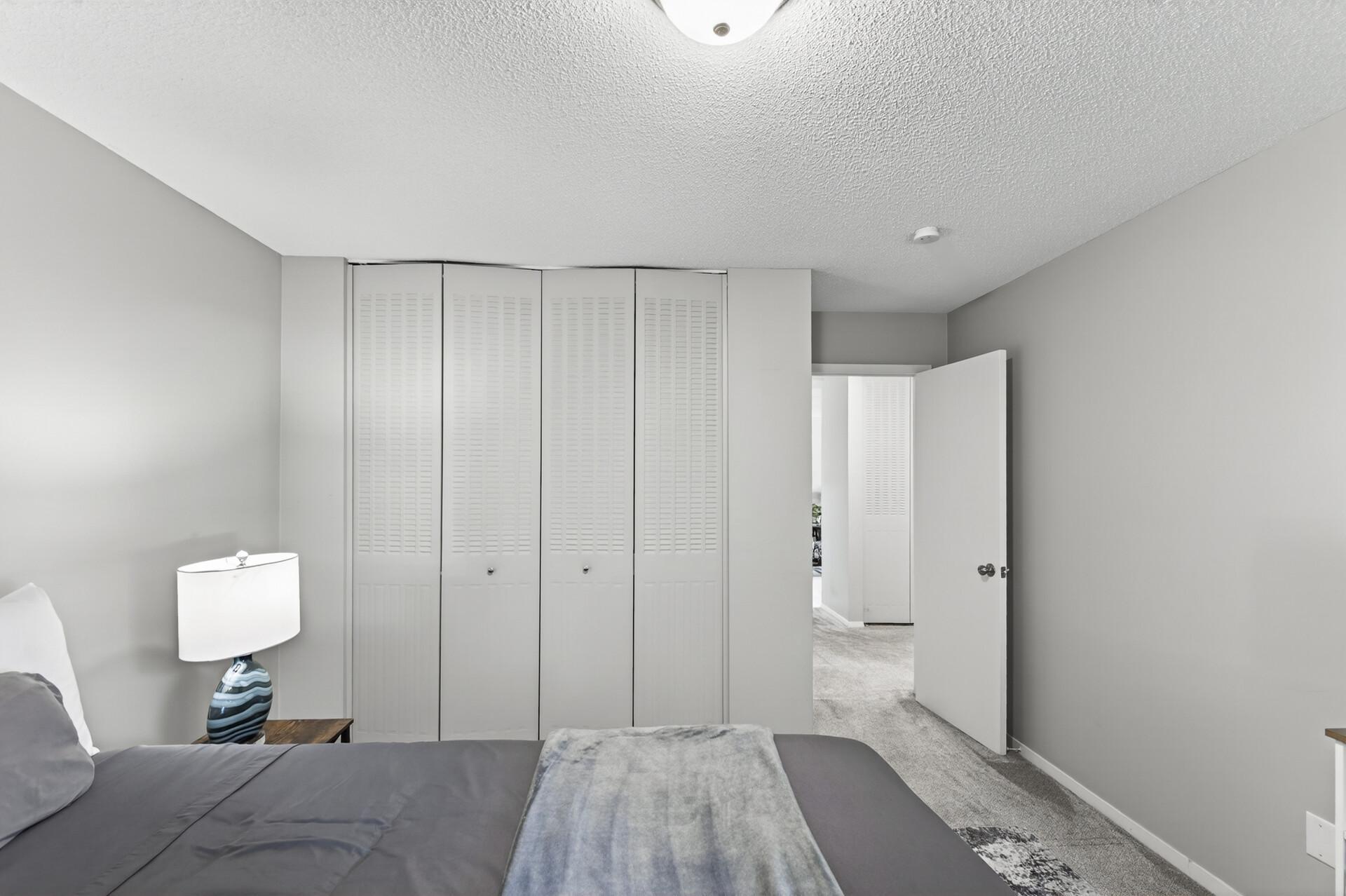 The second bedroom offers impressive floor-to-ceiling closet storage, giving you plenty of room for clothes, linens, seasonal items, and more.