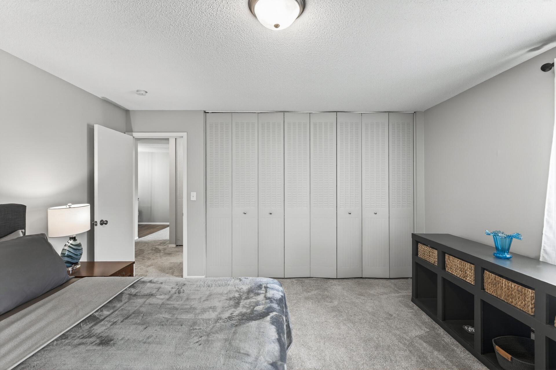 Primary bedroom with oodles of space in the very large closet.