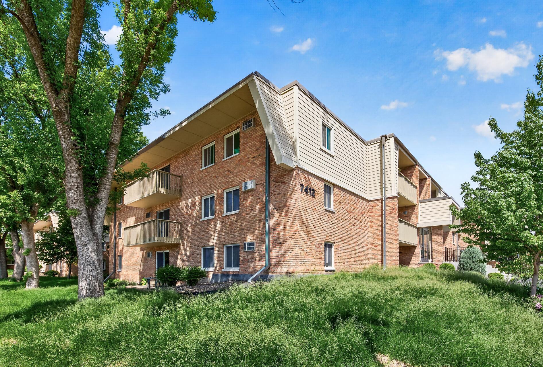 The lower-level walk-out patio adds everyday convenience, with quick access to green space, nearby parks, trails, and St. Louis Park Middle School.
