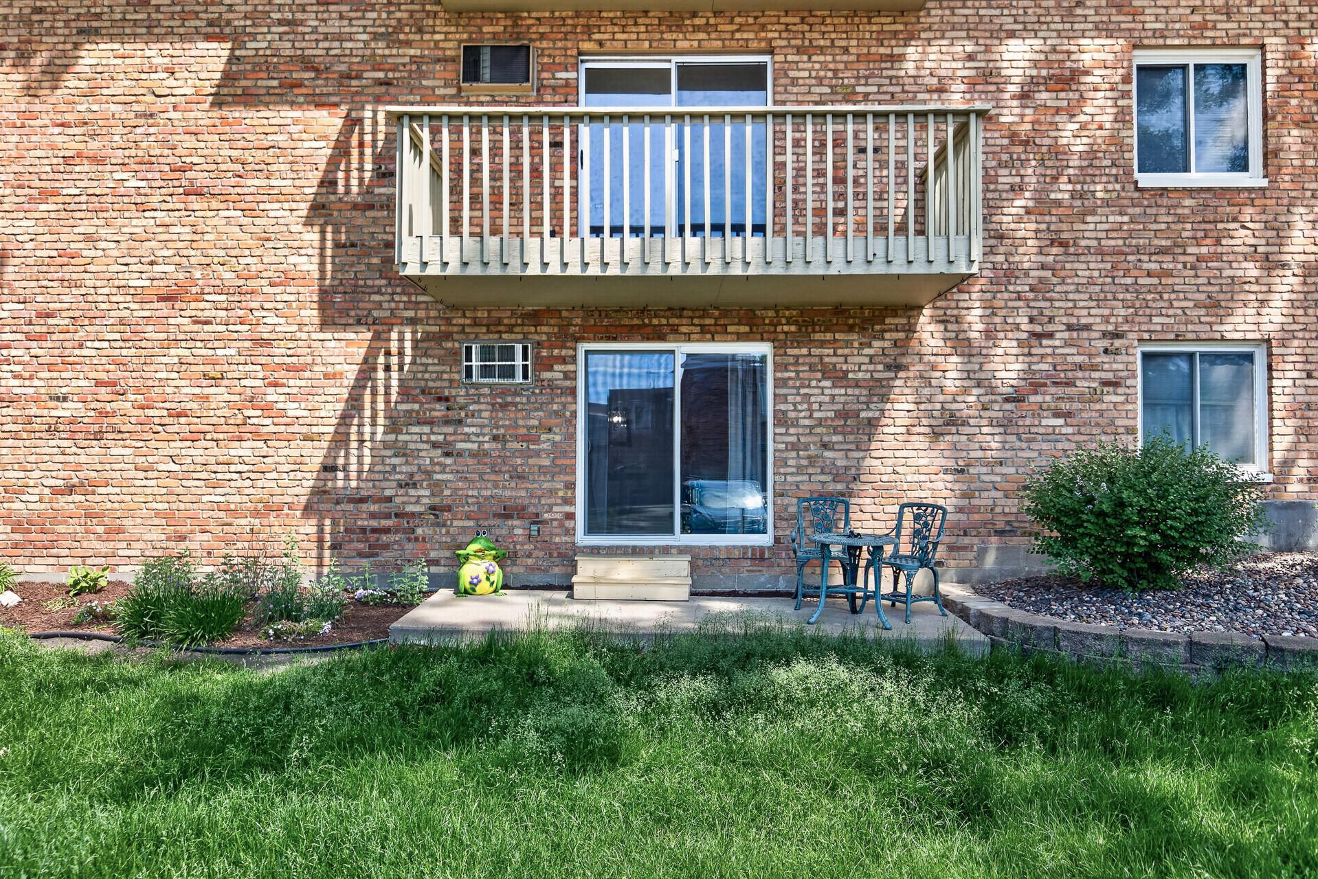 Enjoy soft west-facing light through the large window, plus a walk-out patio that opens right to green space and garden beds.