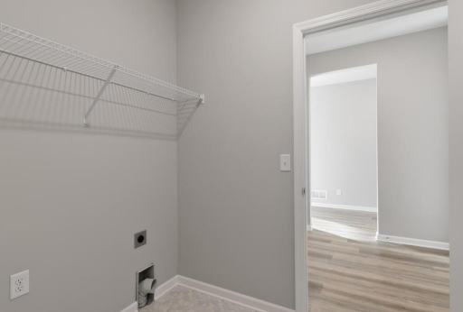 Laundry Room - PHOTO OF A DIFFERENT HOME WITH SIMILAR PLAN. FINISHES MAY VARY.
