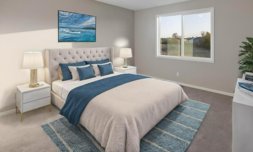 Primary Bedroom PHOTO OF A DIFFERENT HOME WITH SIMILAR PLAN. FINISHES MAY VARY.