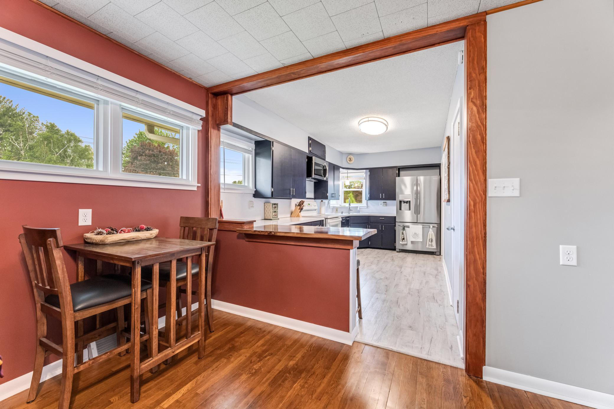 The kitchen opens to the dinette and living room for entertaining ease.