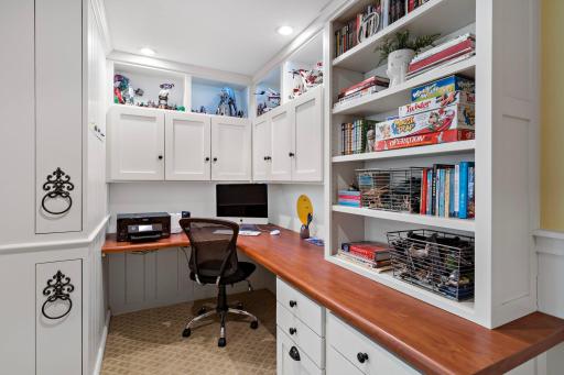 Additional office space tucked back with room for games and office supplies