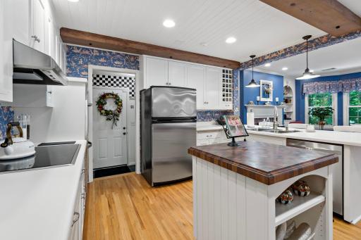 Easily access the mudroom and 3 car garage