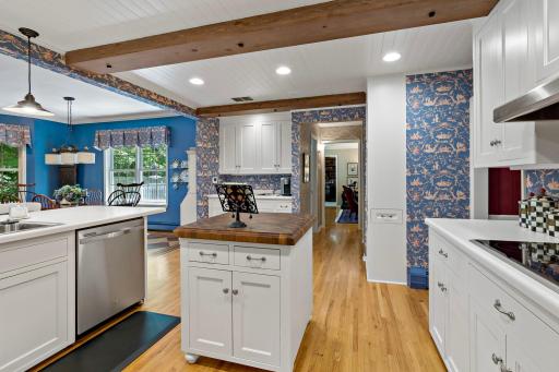 Stunning exposed beams and charming design details add warmth and character