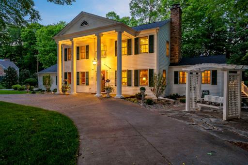 Charming curb appeal as you drive up the circular driveway