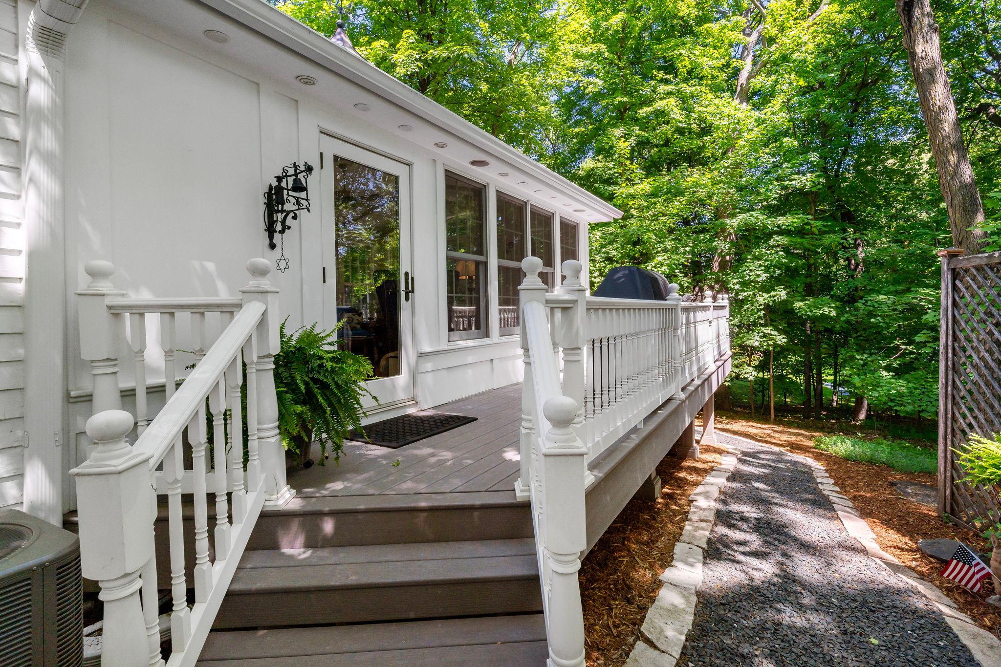 Step out of the sun room to the deck