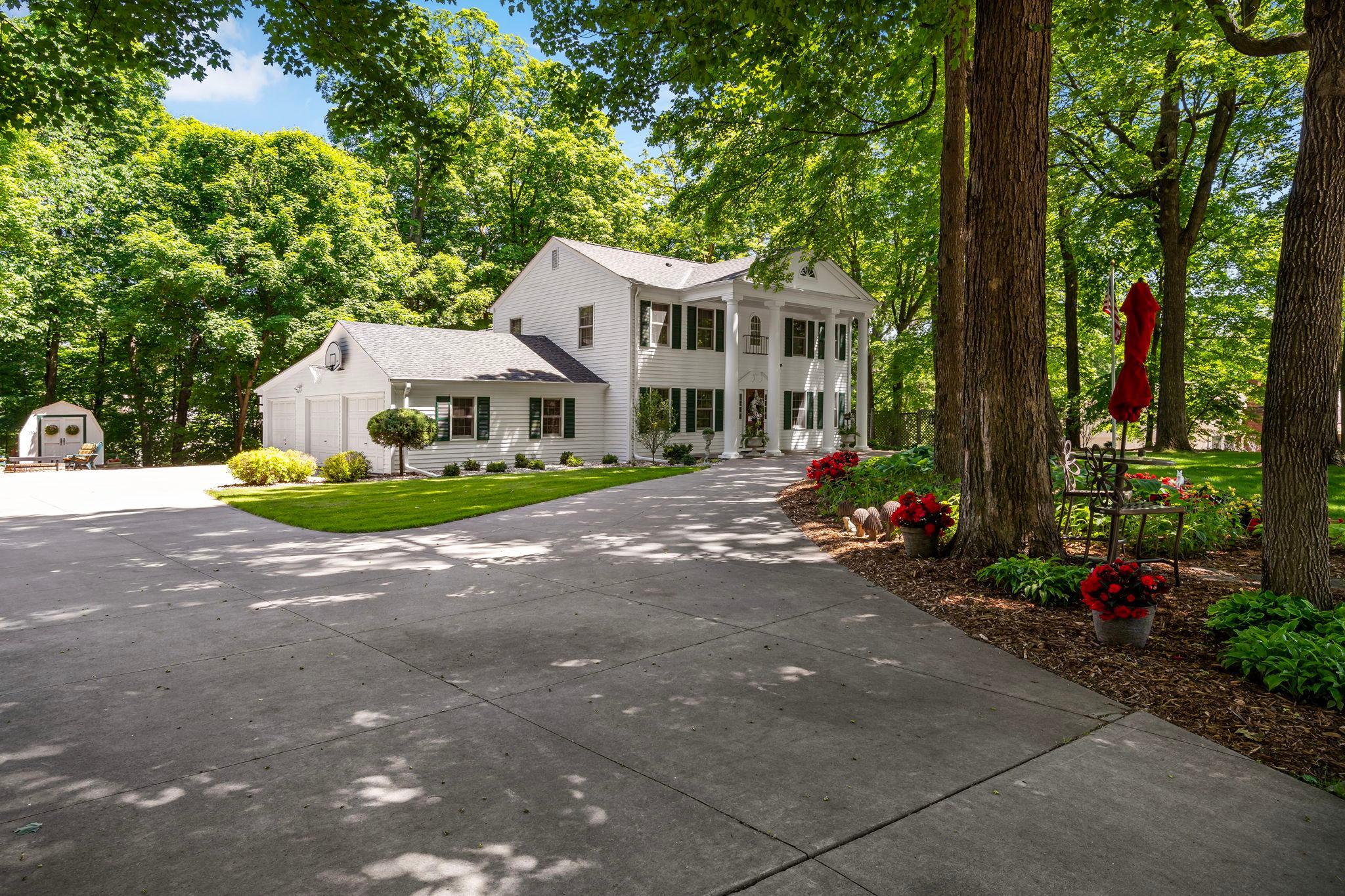 Circular driveway with a 3 car garage
