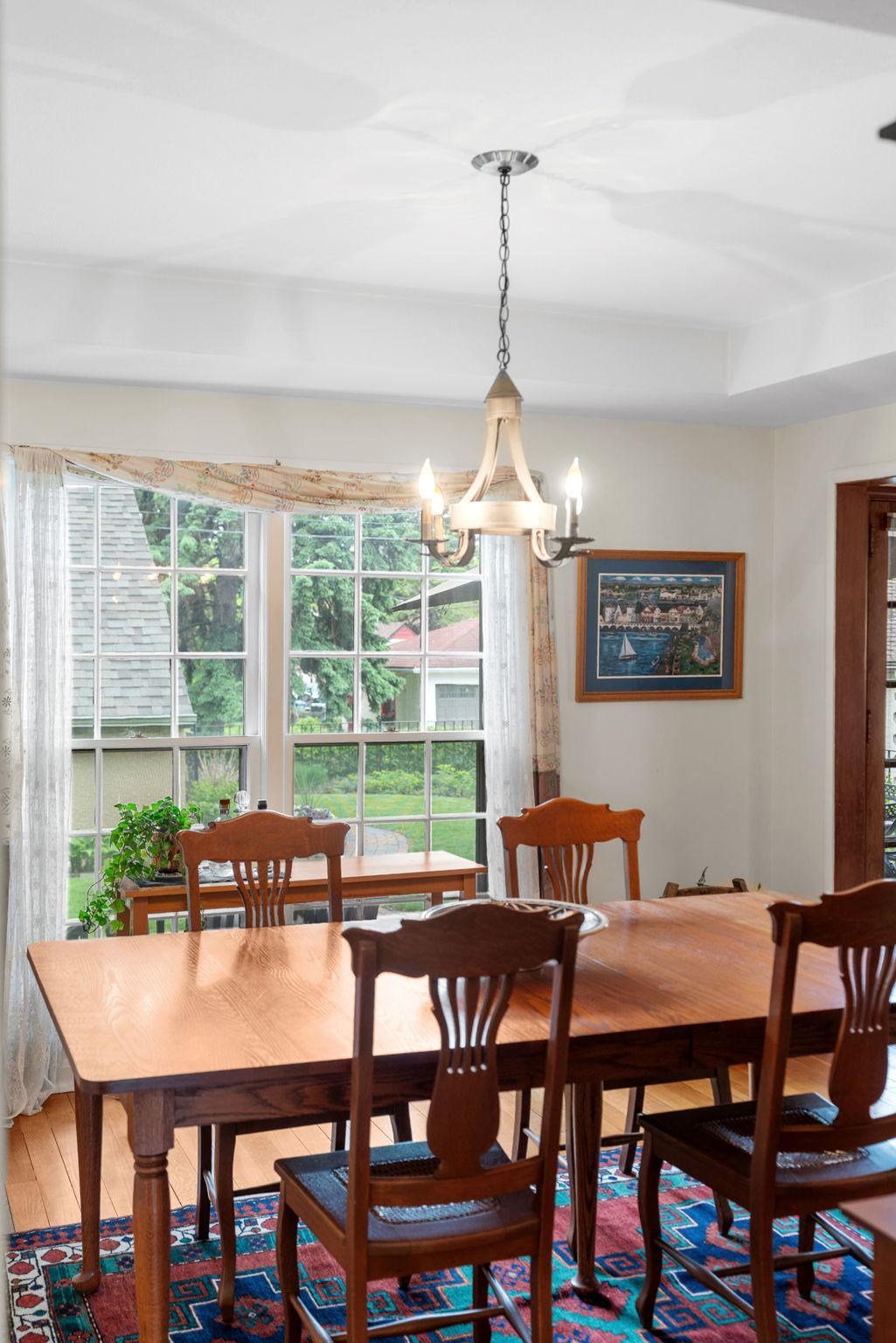 The large window brings in tons of natural light and views of the backyard